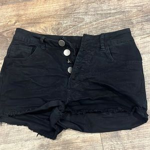Buttoned from elastic Jean shorts. Black. Size medium.